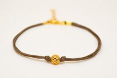 Mother's day gift, Gold ball bracelet, brown cord bracelet with gold bead, gift for mom, minimalist Handmade Gold Braided Bracelet For Everyday, Gold Bracelet With Adjustable Waxed Cord, Gold Waxed Cord Friendship Bracelets, Gold Waxed Cord Friendship Bracelet, Gold Waxed Cord Friendship Bracelets As Gift, Gold Waxed Cord Jewelry For Gifts, Gold Waxed Cord Bracelets For Gifts, Minimalist Brown Braided Bracelet As Gift, Everyday Gold Friendship Bracelets With Waxed Cord