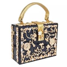 This Handbag Is Very High Quality, Brand New. It Is Victorian Style, Baroque Style. This Is Such An Eye Catcher Luxury Gold Clutch With Top Carry Handle, Gold Box Bag With Top Carry Handle For Gift, Gold Square Box Bag For Shopping, Gold Square Bag With Detachable Strap, Gold Clutch Box Bag With Top Carry Handle, Gift Square Shoulder Bag With Gold-tone Hardware, Square Shoulder Bag With Gold-tone Hardware As Gift, Luxury Black Square Clutch, Gold-tone Hardware Shoulder Box Bag For Gift