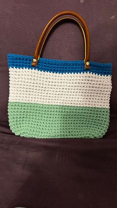 Hand crochet hand bag, perfect for summer vacation. Lined with cute sea turtle fabric. 13inches wide, 10.5 inches deep. Leather handles for comfort. Green Casual Crochet Beach Bag, Casual Green Crochet Beach Bag, Green Crochet Beach Bag For Vacation, Green Crochet Straw Tote Bag, Green Crochet Tote Straw Bag, Green Crochet Beach Bag, Handmade Green Crochet Bag For Beach Season, Green Crochet Beach Bag For Daily Use, Rectangular Macrame Crochet Bag For Travel