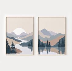 two framed art pieces with mountains and trees on them