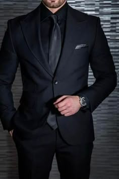 Black Color Men's Luxury Premium 2 Piece Suit/two-piece suit/top/Men's suit/Men's Wedding Suit/ Men's Coats Suit Set. Listing include-:  Blazer, Trouser Color- Black Material- Imported, Viscose, Rayon, Polyester Elevate your style with this exquisite 2 piece suit. Made from premium quality this suit is both stylish and durable, ensuring you'll look and feel your best for years to come. The slim-fit design flatters your figure, while the lightweight fabric keeps you comfortable all day long. The suit includes a classic two-button jacket with notch lapels, a matching vest, and tapered pants with a flat front. The jacket features three flap pockets, a chest pocket, and four interior pockets for storing your essentials. The two side vents provide added comfort and flexibility, allowing you to Formal Suits Men, All Black Suit, Blazer Outfits Men, Black Suit Men, Suits Men Business, Designer Suits For Men, Tuxedo Wedding, Fashion Suits For Men, Men’s Suits