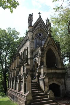 an old building with stairs leading up to it