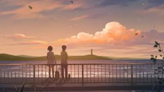 two people standing on a balcony looking out at the ocean and clouds in the sky