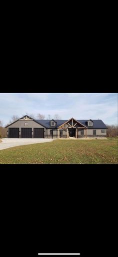 a large house in the middle of a field