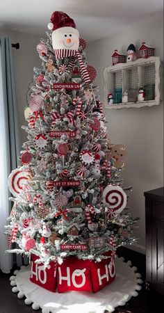 a christmas tree decorated with red and white candy canes