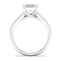 a white gold engagement ring with an oval cut diamond