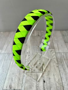 This fluorescent green and black braided headband is made using neon green and black grosgrain ribbons woven into a zig zag pattern and securely attached to a plastic headband.  Headband is 1 inch in width at it's widest point.  Headband is standard size, and will comfortably fit most people from older child to adult.  Don't see the color combination you want? Just message me with your request and I will set up a custom listing. Find me on social media: Instagram: summer.girls.bowtique Facebook: www.facebook.com/summergirlsbowtique Thanks so much for looking! Cybergoth Outfits, Girl Headbands, Pom Pom Girl, Green Accessories, Plastic Headband, Headband For Women, Securely Attached, Braided Headband, Turban Headbands