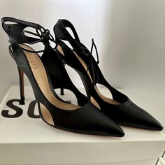 Size 8.5 Sharon Cutout Leather Ankle-Tie Pumps In Black Leather. Also Has Side Cutouts To The Stiletto Pump Topped With A Slim Ankle Strap. Heel Is About 4'' - 5 '' Inches. Brand New ! Never Been Worn ! Comes With Original Box And Original Schutz Dust Bag. Leather Ankle Tie Heels For Party, Leather Ankle Tie Heels For Evening, Ankle Tie Leather Heels For Evening, Evening Ankle Tie Leather Heels, Formal Leather Heels With Ankle Tie, Elegant Black Ankle-tie Heels, Elegant Black Ankle Tie Heels, Leather Heels With 4-inch Heel For Date Night, Leather High Heels For Date Night