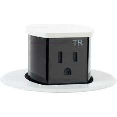 a black and white electrical outlet with the word tr on it's side, in front of a white background