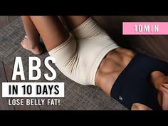 a woman laying on top of a yoga mat with the words abs in 10 days