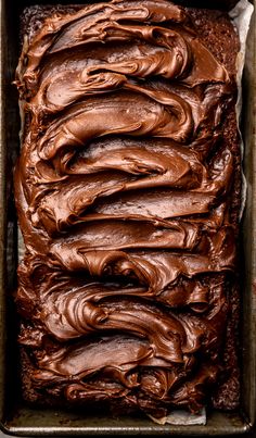 chocolate frosted cake in a baking pan