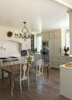 the kitchen is clean and ready to be used as a dining room or family room