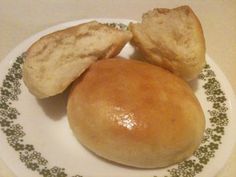 three pieces of bread on a green and white plate