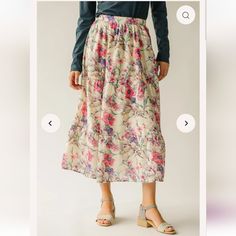 Beautiful Floral Print Skirt, Perfect For Spring Family Pictures Or Just A Day Out. New With Tags, Never Worn, No Flaws. Measurements: Waist Band Measures 14 In (Unstreached) Size Medium Color: Ivory Background With Pink And Purple Flowers. Modest Tiered Skirt, Modest Relaxed Tiered Skirt, Modest Tiered Skirt With Elastic Waistband, Modest Tiered Lined Skirt, Modest Skirt With Elastic Waistband, Modest Tiered Skirt For Spring, Modest Spring Skirt Bottoms, Casual Pink Maxi Skirt With Elastic Waistband, Pink Floral Print Long Skirt