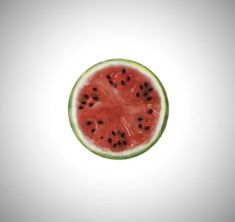 a slice of watermelon is shown in the middle of a white background with black dots