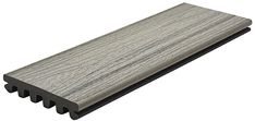 a close up view of the side of a wooden decking board with grey woodgrain