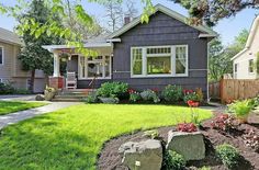 a house with landscaping in the front yard