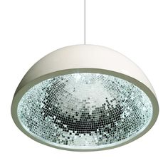 a circular light hanging from the ceiling with mosaic tiles on it's sides and bottom