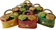 Product Description Haldi KumKum bag set This is a perfect pack for various auspicious occasions such as Raksha Bandhan, varalakshmi pooja etc Handmade customized pack Design: RCP#1103 Festive Traditional Potli Bag, Multicolor Traditional Wear For Navratri Gift, Multicolor Zari Weaving Sets For Puja, Festive Gift Potli Bag, Multicolor Traditional Wear For Festivals As Gift, Multicolor Traditional Wear As Festival Gift, Bollywood Style Multicolor Potli Bag For Diwali, Multicolor Zari Work Potli Bag For Diwali, Eid Gift Sets With Zari Work