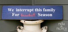 a blue sign that says we interruppt this family for baseball season on it