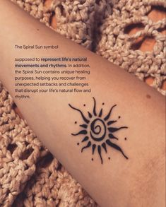 a woman's arm with a quote about the sun and her meaning on it