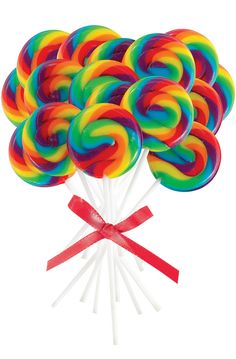 lollipops with red ribbon tied around them on a white background in color