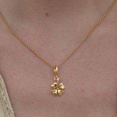 This gorgeous Gold Plated Four Leaf Clover Necklace is an iconic symbol of luck and prosperity! It's a beautiful accessory that you'll feel blessed to have each day you wear it. It's a special piece that is perfect for wear or gifting - absolutely not your typical charm necklace!  All our charms attach with a clip-on clasp and are compatible with all other leading charm jewellery brands. Simply clip-on or slide-on to a chain, charm bracelet or charm carrier necklace.  All Lily Charmed jewellery Dainty Flower Pendant Charm Necklace For Good Luck, Dainty Good Luck Flower Pendant Charm Necklace, Gold Flower Pendant Necklace For Good Luck, Elegant Good Luck Jewelry With Flower Charm, Yellow Gold Necklaces For Good Luck, Yellow Gold Good Luck Necklace, Dainty Flower Pendant Jewelry For Good Luck, Dainty Good Luck Jewelry With Flower Pendant, 4 Leaf Clover Necklace