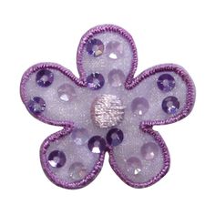 an image of a purple flower with sequins on it's center and the words $ 4 99