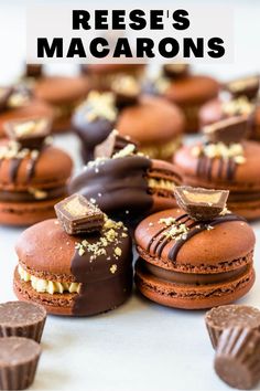 several chocolate desserts are arranged on a table