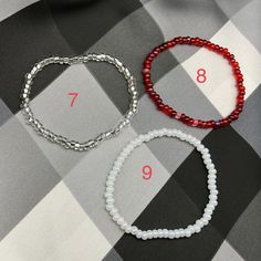 Valentine's Day Silver Beaded Bracelets, Valentine's Day Silver Beaded Crystal Bracelet, Valentine's Day Silver Beaded Bracelets With Round Beads, Dainty White Stretch Bracelet As Gift, Handmade Silver Beaded Bracelets For Valentine's Day, Silver Crystal Bracelet With Heart And Round Beads, Silver Crystal Bracelet With Heart Shaped Beads, Silver Beaded Crystal Bracelet For Valentine's Day, Everyday Red Stretch Bracelet With Round Beads