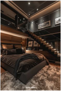 a large bed sitting in the middle of a bedroom next to a stair case above it