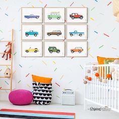 a child's room with cars and confetti on the wall