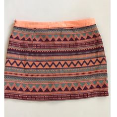 Andre Peach Multicolored Mini Skirt Size Medium Colors: Peach, Blue And Purple Zips On The Side In Good Condition Length 29 In Waist 14 In Summer Patterned Mini Skirt, Multicolor Mini Skort For Beach, Multicolor Lined Skort For Vacation, Multicolor Mini Skort For Day Out, Multicolor Summer Skort With Lined Skirt, Multicolor Lined Mini Skirt For Summer, Multicolor Mini Skirt With Lined Skirt For Day Out, Beach Skort In Multicolor With Lined Skirt, Multicolor Lined Mini Skirt For Day Out