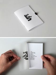 two different views of an open book with the words made out of black and white paper