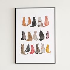 an art print with nine different colored cats sitting in front of each other on a white wall