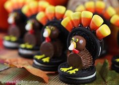 a group of cookies decorated to look like turkeys