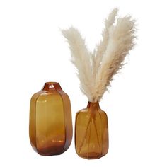 two brown vases with white feathers in them on a white background and one is empty