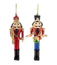 two nutcrackers are standing next to each other