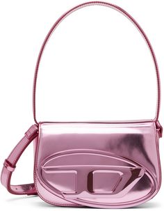 Structured patent leather top handle bag in metallic pink. · Fixed carry handle · Detachable and adjustable shoulder strap · Logo hardware at face · Concealed patch pockets at face · Foldover flap with magnetic press-stud closure · Patch pocket at interior · Twill lining in black · H5 x W8 x D2.25 in Supplier color: Pink 1dr Bag, Diesel Bag, Diesel Clothing, Metallic Pink, Press Studs, Handle Bag, Leather Top, Luxury Streetwear, Patch Pocket