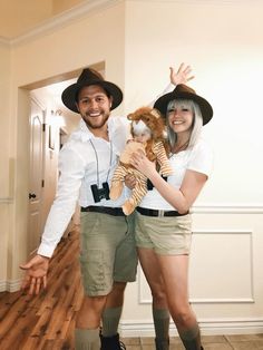 a man and woman dressed up in costumes