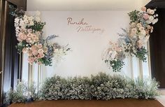 an image of a wedding backdrop with flowers