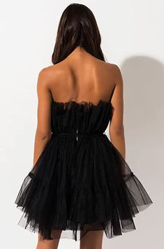 Step into high fashion with this stunning French Tulle Strapless Black Dress. The combination of French tulle and the strapless design elevate any look, making you stand out in any crowd. Experience the ultimate blend of elegance and style with this must-have dress. 95% Polyester, 5% Spandex Pull On closure Brand Size Dress Bust Waist Hip XS 0-2 31-32.5'' 23-24'' 31-34" S 4--6 33-35'' 25-26'' 35-37" M 8--10 35-36'' 27-28'' 38-39" L 12--14 38-40'' 29-31'' 40-42" XL 14-16 40-42'' 33.5-36'' 44-46" Black High Fashion, Tulle Mini Dress, Black Strapless Dress, Pleated Maxi Dress, Pleated Maxi, Tulle Prom Dress, Long Sleeve Maxi Dress, Cocktail Dress Party, Set Dress