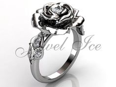 a rose ring with diamonds on it