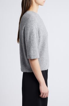 This cozy and substantial sweater features wide sleeves and a relaxed fit for a style that's destined to be an off-duty favorite. Crewneck Elbow-length sleeves 40% alpaca, 32% wool, 24% polyamide, 4% elastane Dry clean or hand wash, dry flat Imported Oversized Heather Grey Crew Neck Sweater, Cozy Heather Grey Crew Neck Sweater, Relaxed Fit Heather Grey Crew Neck Sweater, Heather Grey Cotton Crew Sweater, Gray Merino Wool Crew Neck Sweater, Elbow Length Sleeve, Wide Sleeves, Crewneck Sweater, A Style