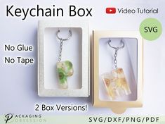 two keychain boxes with no glue, no tape and 2 box versions in each