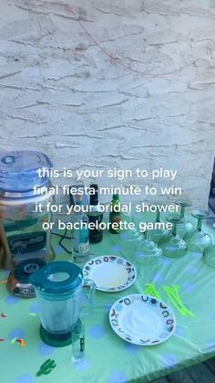 there is a table with plates and cups on it that says, this is your sign to play final first minute to win