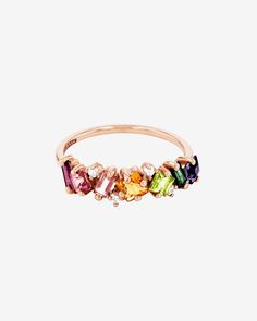 Handcrafted with 14-karat gold, this ring is a refresh of our best selling 'Amalfi Blend' half band. This ring is set with beautifully arranged rainbow ombre gemstones and complimented with brilliant round white diamonds, adding some extra sparkle. Details 14k yellow gold or rose gold 4x2mm baguette-cut rhodolite, morganite topaz and green envy topaz 3x3mm princess-cut pink topaz, peridot topaz and iolite 4x4mm clover-cut citrine quartz 0.30 carats of round white diamonds Ref: PR555-RBW Rainbow Ombre, Rainbow Gemstones, Pink Topaz, Baguette Cut, White Diamonds, Morganite, Princess Cut, Diamond White, Or Rose