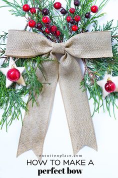 an image of a christmas bow with berries and pine cones on the front, text reads how to make a perfect bow