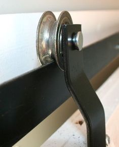 an image of a black door handle on a white door with text that reads, interior doors you can use full - size sliding barn doors as party or closets