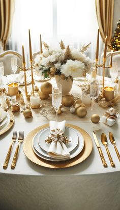 the table is set with gold and white dishes